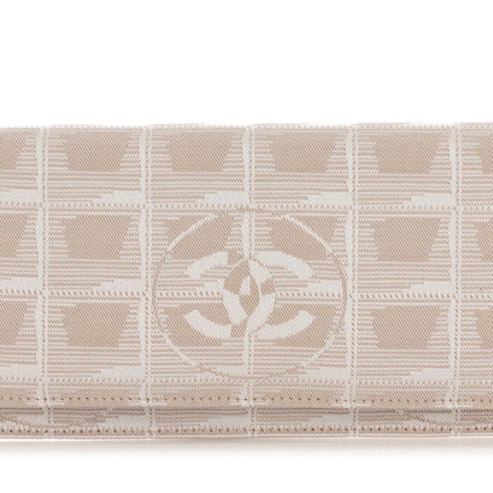 CHANEL Beige Patterned Clutch